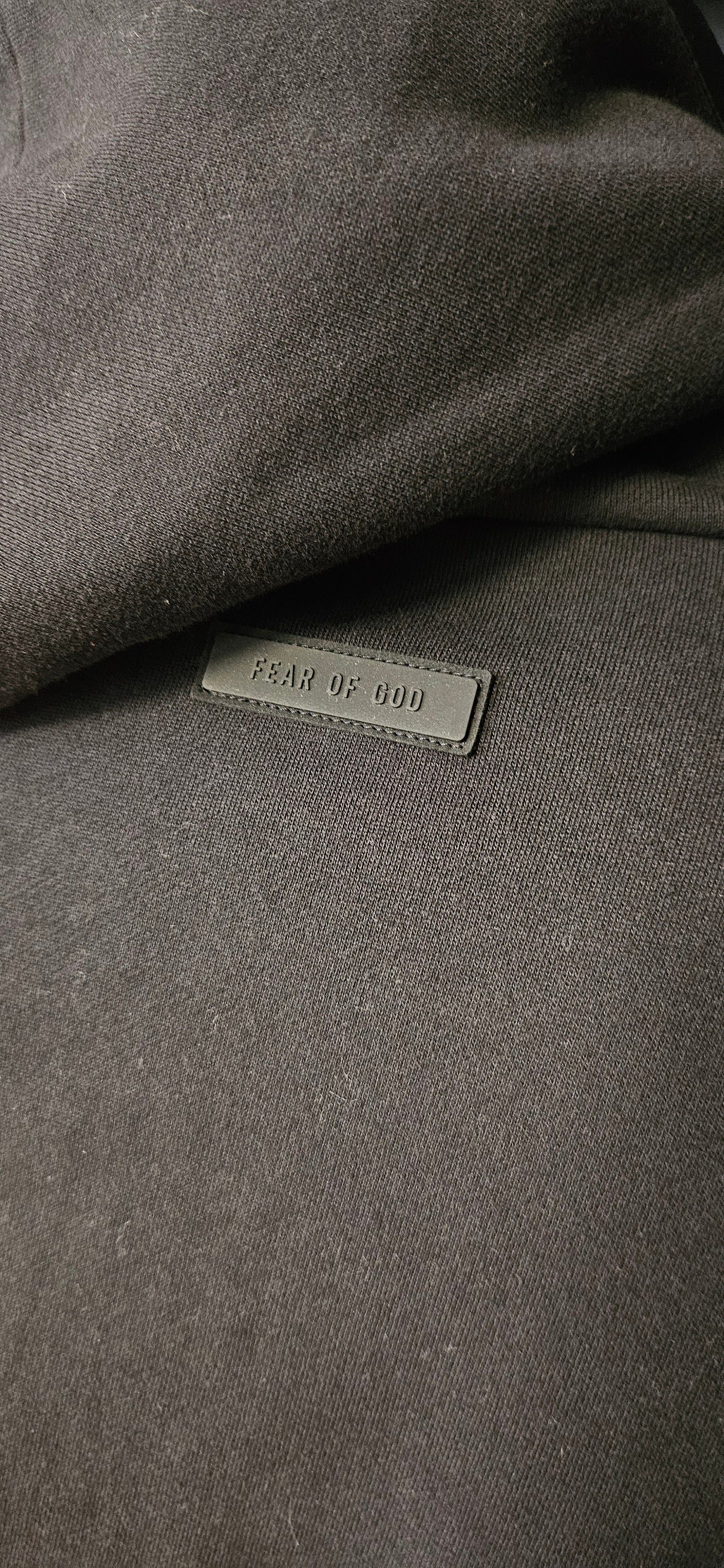Fear Of God Essentials Logo Tab Cotton Hoodie In Black In Size Large